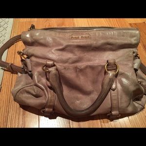 Worn, light purple/pink Vitello bow Miu Miu bag